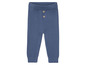 Blaue Strickhose für Babys mit Knöpfen.