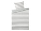 Ein gestreiftes Bettbezug-Set mit Kissenbezug.