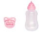 Eine rosa Babyflasche und ein Schnuller für Puppen.