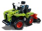 Ein LEGO Technic Claas Traktormodell mit einer Mähmaschine.