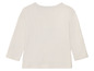 Weißes Langarmshirt für Babys.