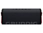 Ein schwarzer tragbarer Bluetooth-Lautsprecher der Marke 'GRUNDIG'.