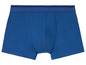 Blaue Boxershorts mit schwarzem Gummizug.