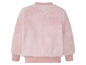 Ein rosa Fleece-Pullover mit langen Ärmeln.