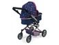 Ein blauer Kinderwagen mit rosafarbenem Sternmuster