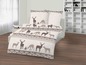 Beige Bettbezug mit Hirsch-Motiv.