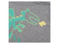 Ein graues T-Shirt mit einem fluoreszierenden Drachen.