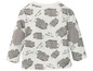 Baby-Langarmshirt mit grau-weißem Rhinozeros-Motiv und dem Schriftzug 'be a little wild'.
