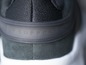 Schwarze Sneaker mit 'SUPPORT'-Logo