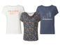 Drei T-Shirts, ein weißes mit dem Schriftzug 'Prairie Girl', ein paisley gemustertes und ein dunkelblaues mit Kakteen.
