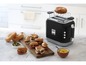 Ein schwarzer Kenwood KMix Toaster mit Bagels und Dip