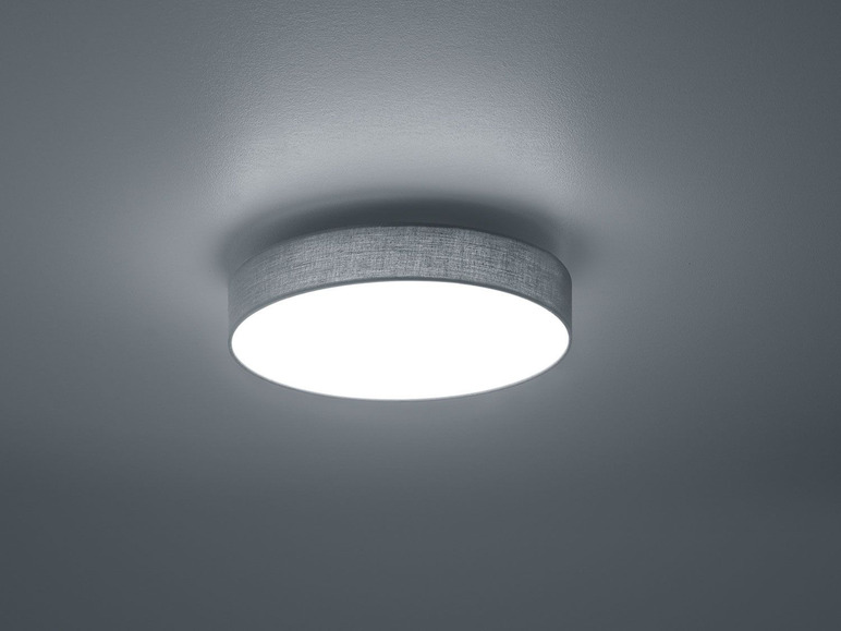 Eine moderne, runde Deckenleuchte mit einem grauen Stoffschirm.