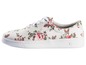 Weiße Sneaker mit Blumenmuster.