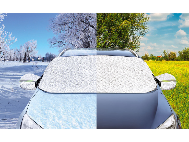 Ein Auto mit silberner Sonnenschutzfolie, Winter- und Sommerlandschaft