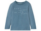 Ein blauer Baby-Langarmshirt mit dem Aufdruck 'Baby, you are the universe'.
