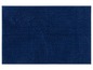 Eine dunkelblaue Badematte mit einer weichen, kugeligen Textur.