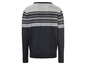 Ein dunkelblauer Pullover mit einem weißen und grauen Muster.