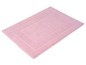 Eine rosa Badematte mit einem detaillierten Randdesign.