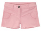 Rosa Denim Shorts mit Fransen.