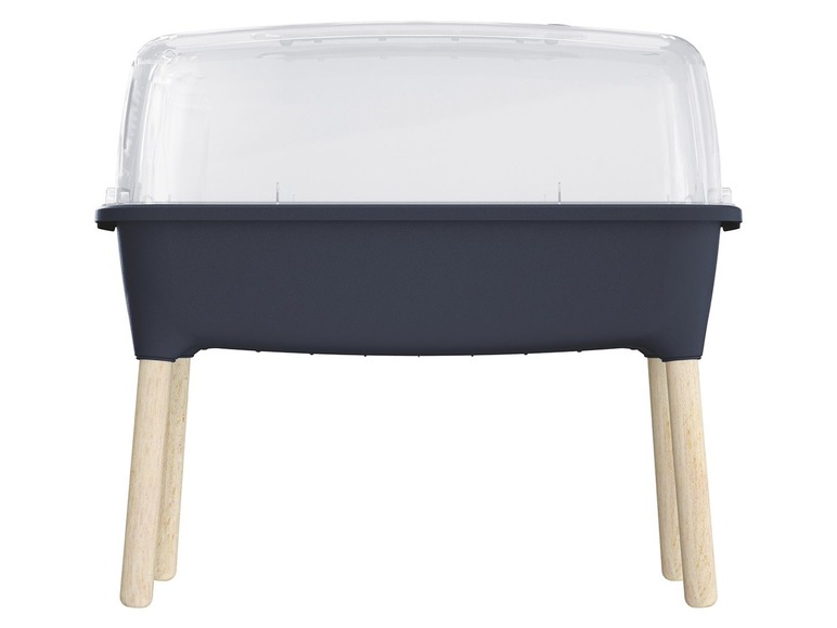 Ein blauer Anzuchtkasten mit transparentem Deckel und Holzbeinen.