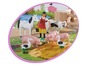 Ein Bauernhof-Spielset mit Pferd, Kuh, Schweinen und einer Bäuerin.