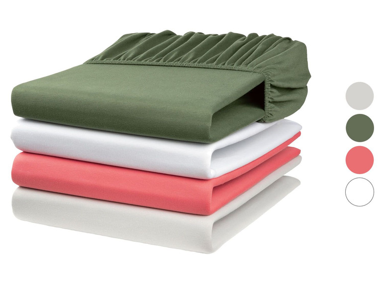 Grüne, weiße und rosafarbene Spannbettlaken