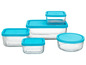 Ein Satz gläserner Aufbewahrungsbehälter mit blauen Deckeln von Pyrex.