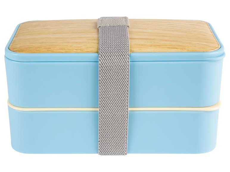 Eine blaue Lunchbox mit Holzdeckel und einem Band.