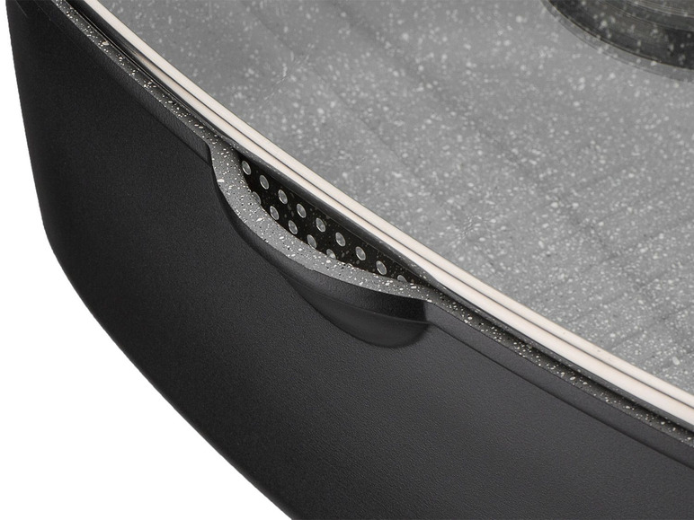 Ein schwarzer Topf mit Glasdeckel und integriertem Sieb.