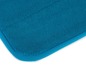 Ein blauer Badeteppich mit einer dicken, flauschigen Textur.