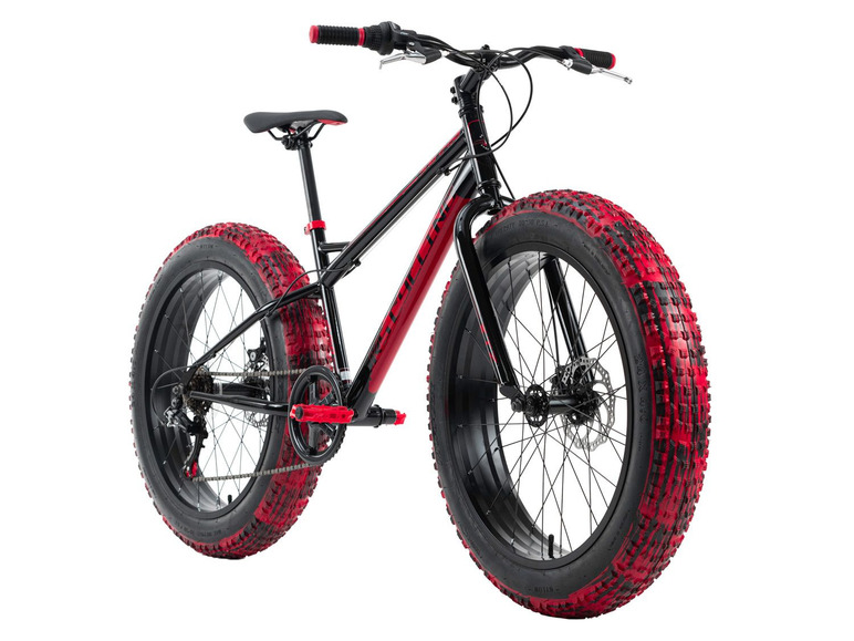 Ein schwarzes Fatbike mit roten Reifen.