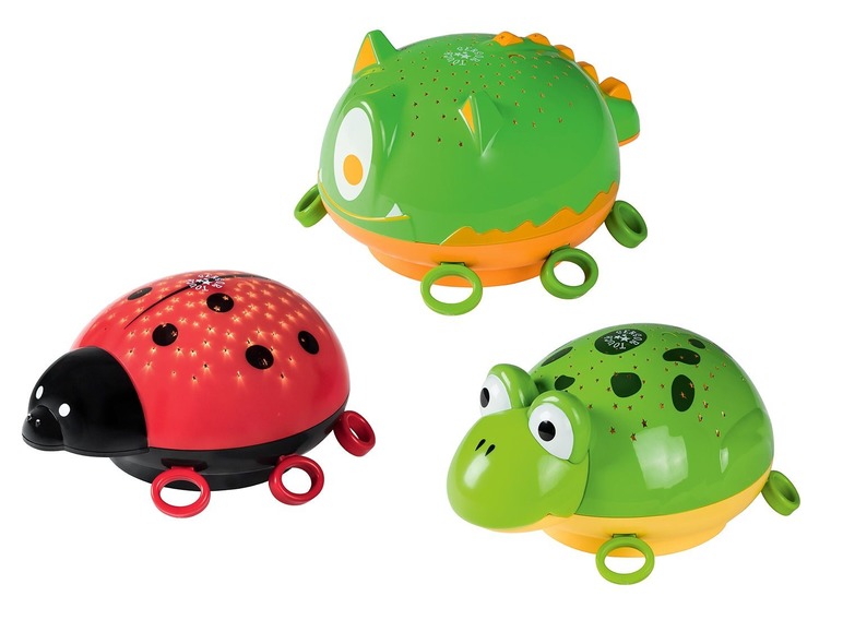 Drei Kinderlampen mit Sternenprojektion: Marienkäfer, Frosch und Drache.
