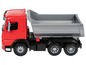 Ein roter Spielzeug-LKW mit Kippladefläche.