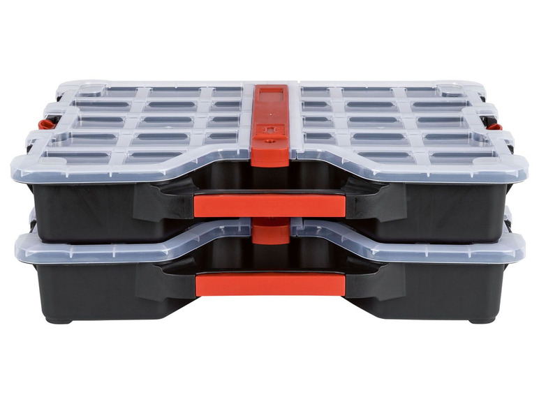 Zwei schwarze Aufbewahrungsboxen mit roten Griffen und transparenten Deckeln.