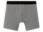 Graue Boxershorts mit schwarzem Bund.