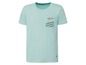 Hellblaues T-Shirt mit 'Miami'-Print und Palme auf der Brusttasche.