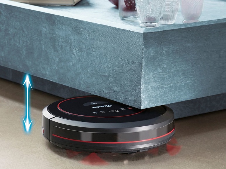 Ein Vorwerk-Roboterstaubsauger, der unter einem Möbelstück reinigt.