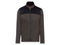 Dunkelgrüne Fleecejacke mit schwarzen Einsätzen.