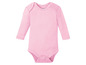 Ein rosa Baby-Body mit langen Ärmeln.