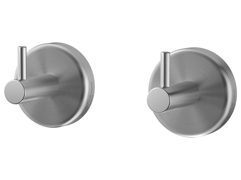 Zwei runde, silberne Haken für die Wand