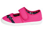 Rosa Kinderschuhe mit Schleife und Klettverschluss.