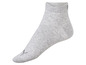 Graue Puma Socken mit niedriger Schafthöhe.