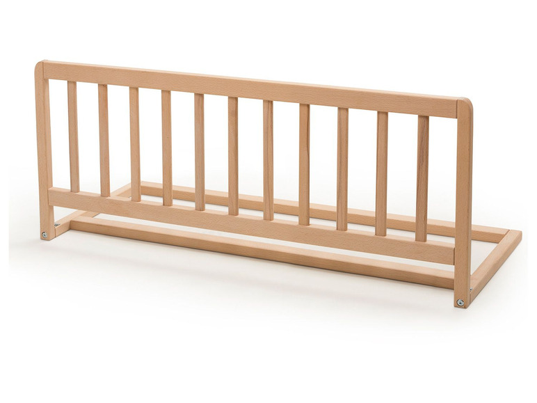 Ein Holz-Bettschutzgitter für zusätzliche Sicherheit im Kinderbett.