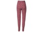 Dunkelrosa Leggings mit Blumenmuster.