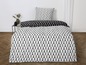 Betwäsche in Schwarz-Weiß mit geometrischem Muster.