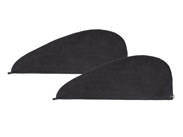 Zwei schwarze Mikrofaser-Handtücher zum Trocknen von Haaren.