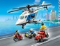 LEGO City Polizeihubschrauber verfolgt ein rotes Auto mit Diamanten.