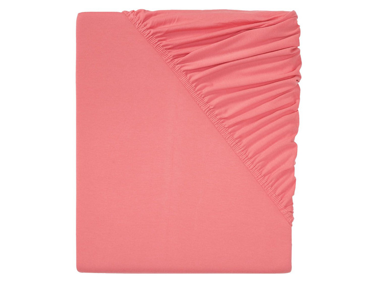 Ein rosa Spannbettlaken für eine Matratze.