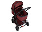 Ein roter Safety 1st Kinderwagen mit Wanne und Sitz.