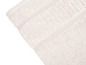 Ein weiches, cremefarbenes Handtuch mit geriffeltem Rand.